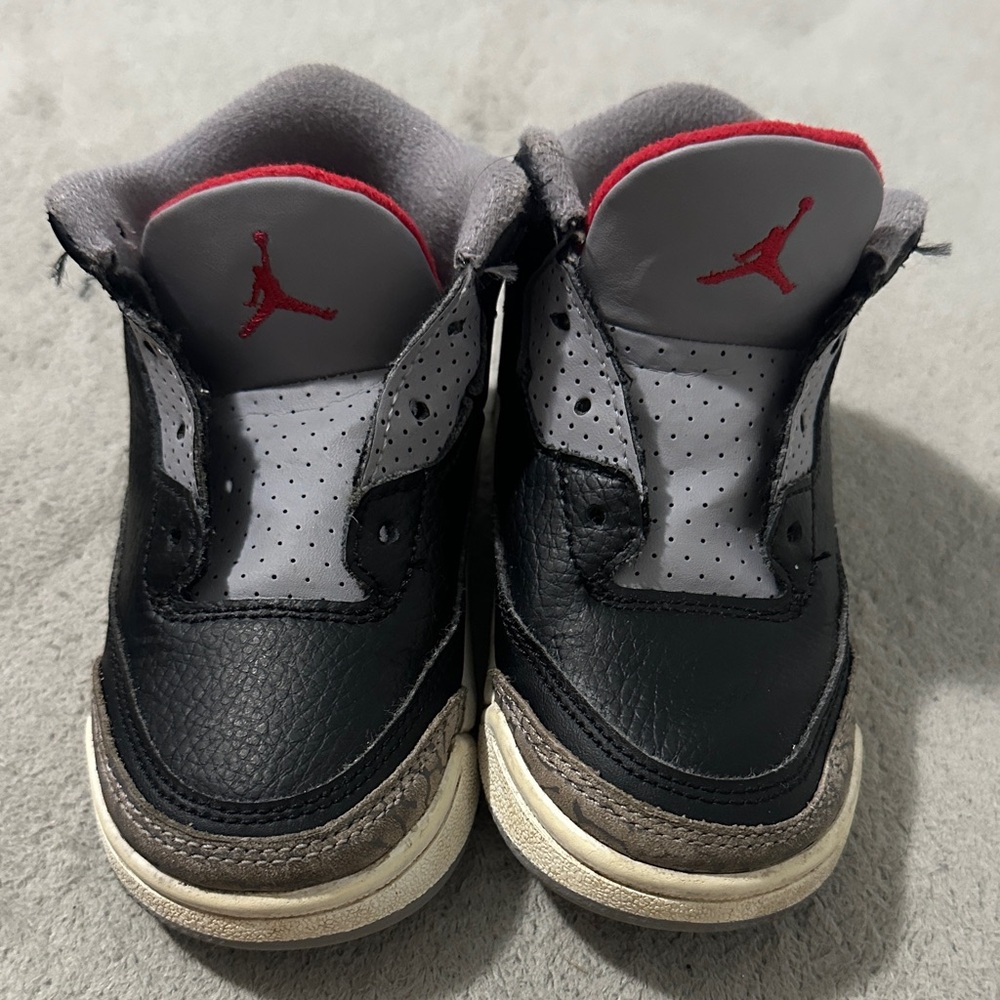 Nike Kids Black and Gray Sneakers with Red Accents